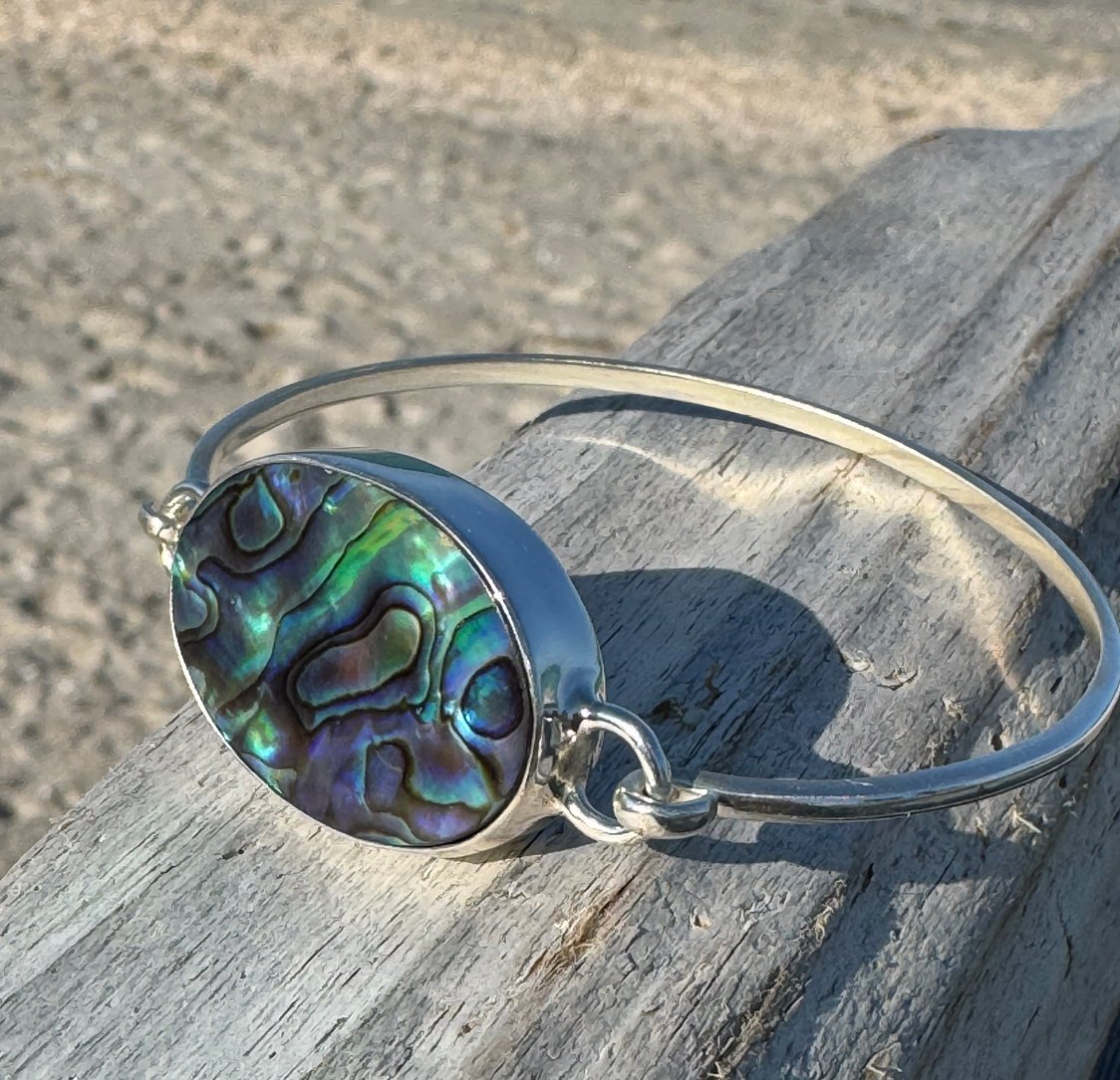 Abalone shell bangle bracelet – sterling silver hinged ocean-inspired jewelry with blue, purple, and green swirls