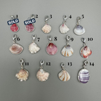 Sterling silver-wrapped natural shell charms from southwest Florida, 0.5–0.75 inches, perfect for bracelets or anklets.