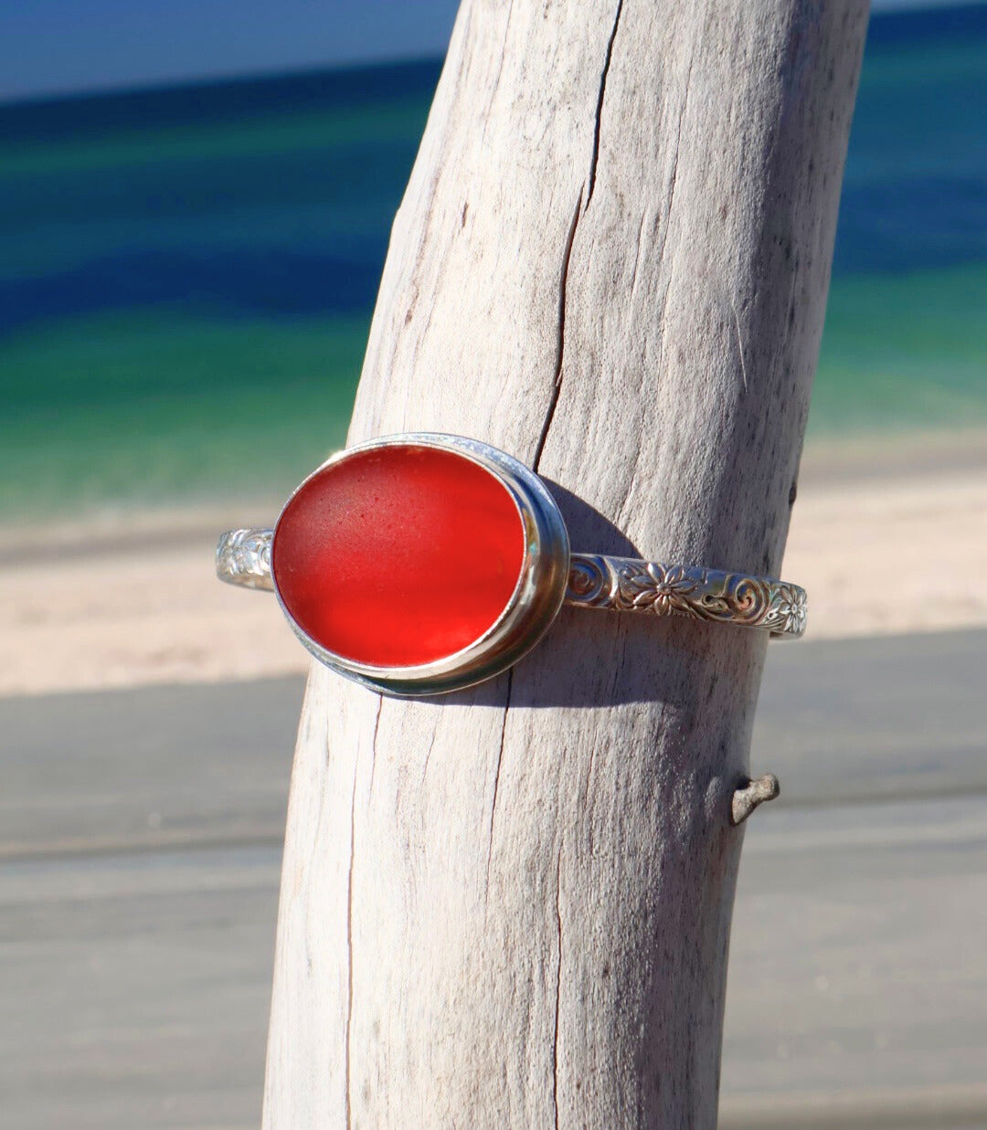 Amberina sea glass cuff bracelet – sterling silver adjustable jewelry with glowing red-orange glass from Spain