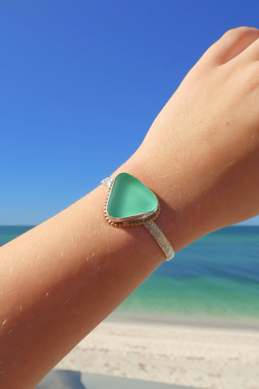 Bahamas green sea glass cuff bracelet – sterling silver and gold detail, ocean-tumbled jewelry
