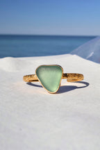 Blue-green sea glass decorative cuff bracelet – gold vermeil, handcrafted ocean-inspired jewelry
