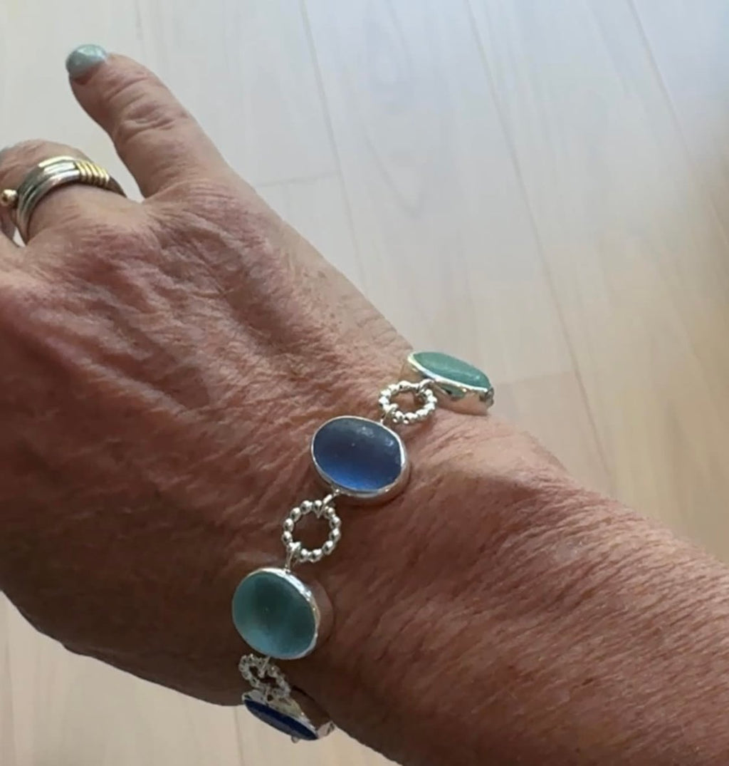 Exceptional blue sea glass multi-bezel bracelet – sterling silver handcrafted ocean jewelry from Russia