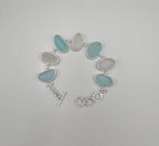 Blue and white Italian sea glass bracelet set in sterling silver with adjustable toggle closure