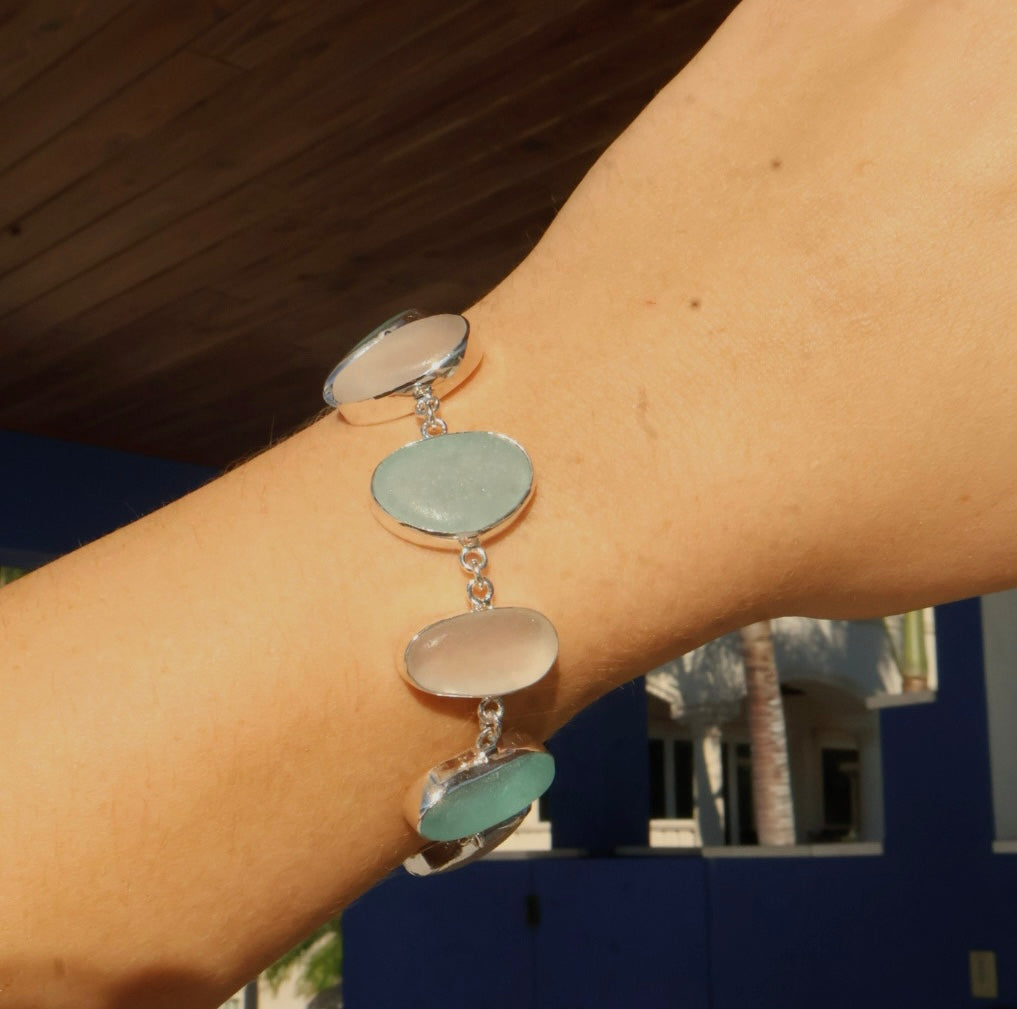 Blue and white Italian sea glass bracelet set in sterling silver with adjustable toggle closure