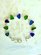 Sterling silver bracelet featuring cobalt blue and lime green sea glass from the Jersey Shore.