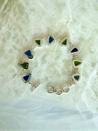 Sterling silver bracelet featuring cobalt blue and lime green sea glass from the Jersey Shore.