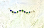 Sterling silver bracelet featuring cobalt blue and lime green sea glass from the Jersey Shore.