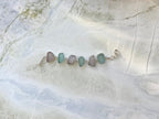 Sterling silver bracelet featuring pale blue and lavender sea glass from Glass Beach, Fort Bragg, California.