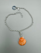 Sterling silver adjustable ankle bracelet featuring a pink scallop shell charm and swimming mermaid logo tag from southwest Florida.