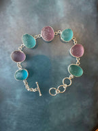 Rare turquoise, blue, and purple sea glass bracelet – handcrafted sterling silver ocean jewelry